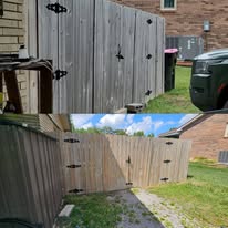 Wood privacy fence before and after pressure washing